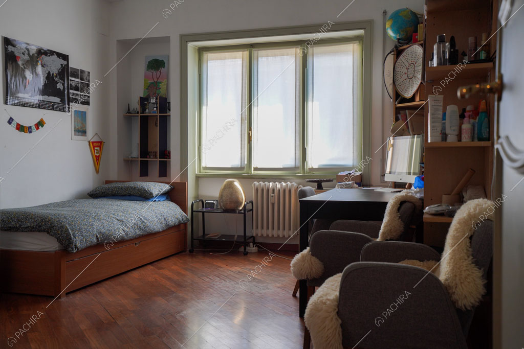 Camera da letto dell'appartamento Volga, location in stile moderno a Roma