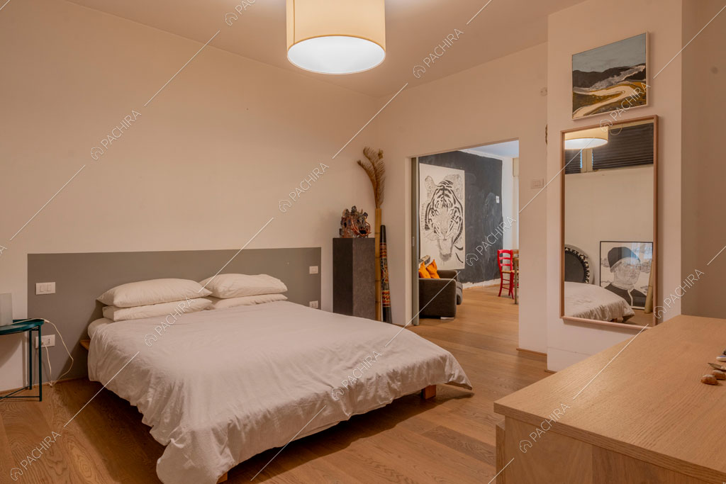 Camera da letto dell'appartamento Mungo, location in stile contemporaneo a Milano