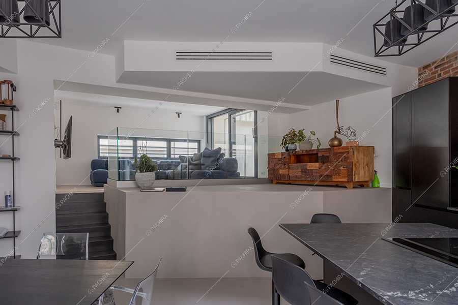 Zona living del loft Ob, location in stile moderno a Milano