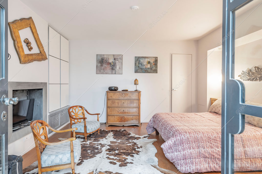 Camera da letto matrimoniale dell'appartamento Catalpa, location in stile moderno a Roma