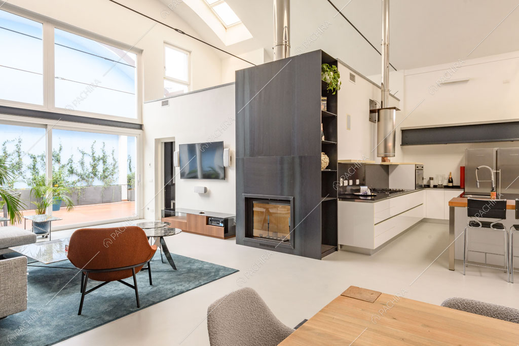 Camino nella zona living del loft Genepi, location in stile contemporaneo a Milano