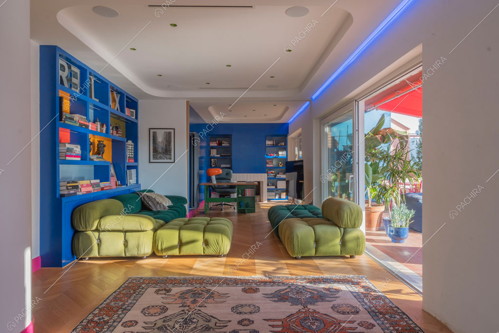 Zona living dell'appartamento Gila, location in stile contemporaneo a Roma
