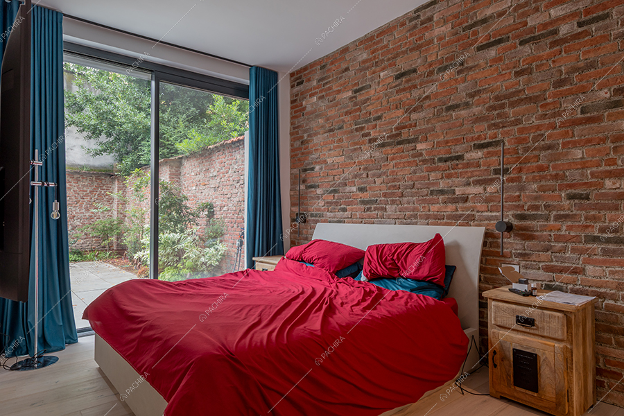 Camera da letto del loft Ob, location in stile moderno a Milano