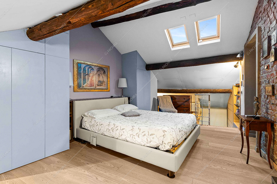 Camera da letto dell'appartamento Hood, location in stile moderno a Milano