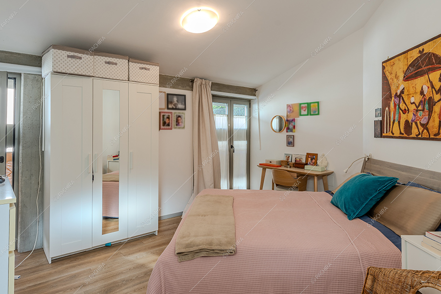Camera da letto del loft Tocantis, location in stile moderno a Milano