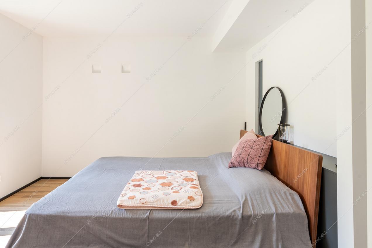 Camera da letto della villa Guadiana, location in stile moderno a Como