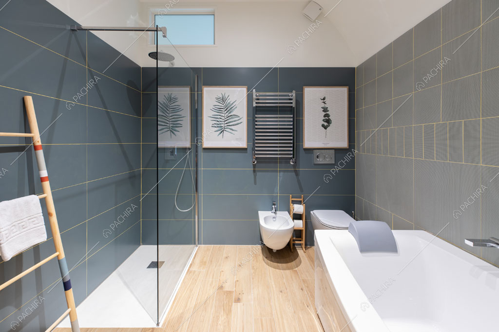 Bagno con vasca e box doccia nell'appartamento Crescione, location in stile contemporaneo a Roma