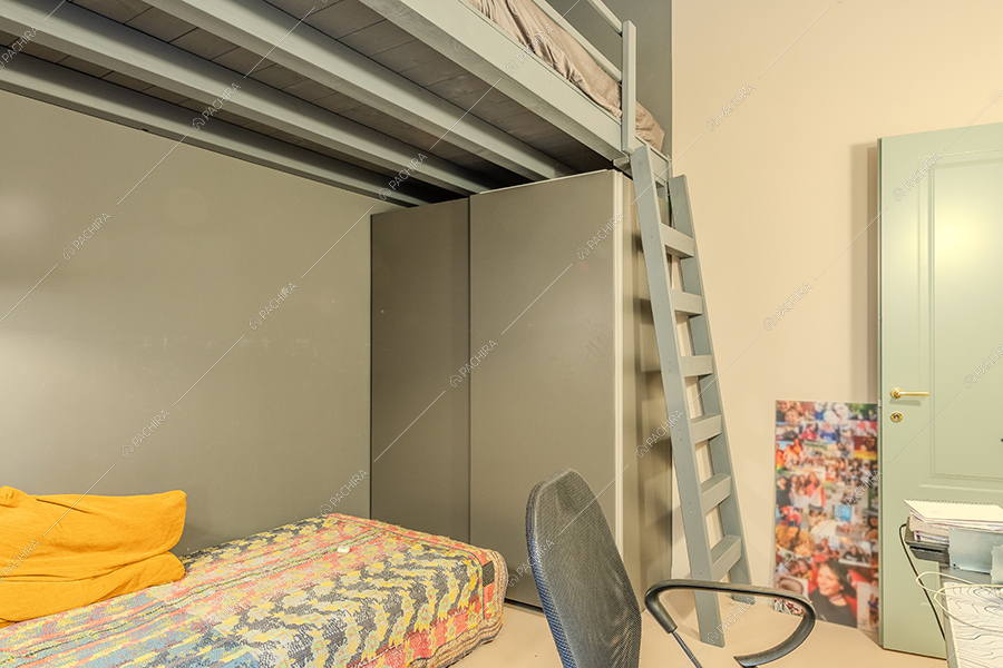 Camera da letto dell'appartamento Buganvilla, location in stile moderno a Milano