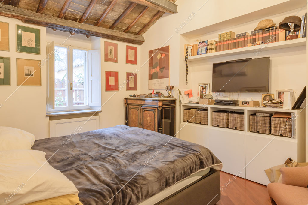 Camera da letto del loft Rooibois, location in stile moderno per shooting a Roma