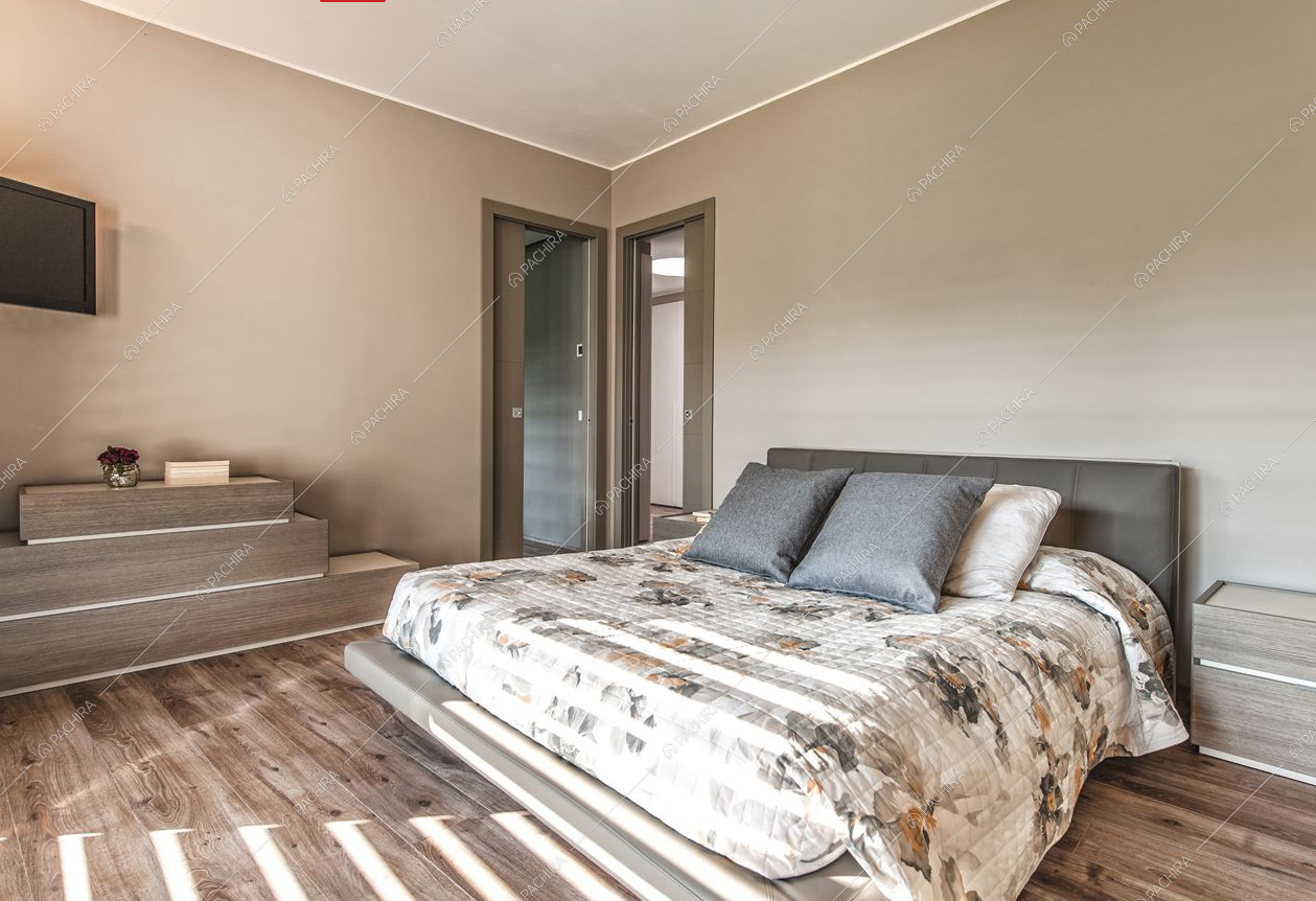 Camera da letto matrimoniale e pavimento in parquet