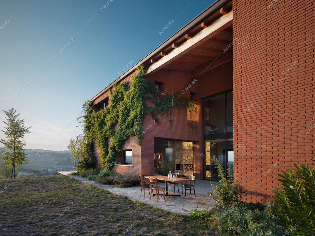 Esterni della villa con pareti in mattoni rossi