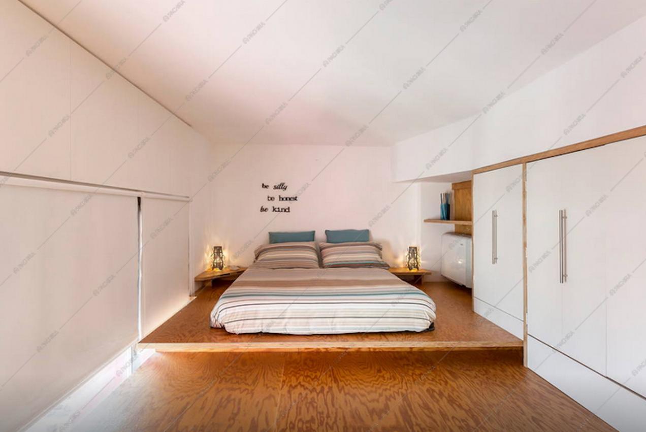 Camera da letto del loft a Milano