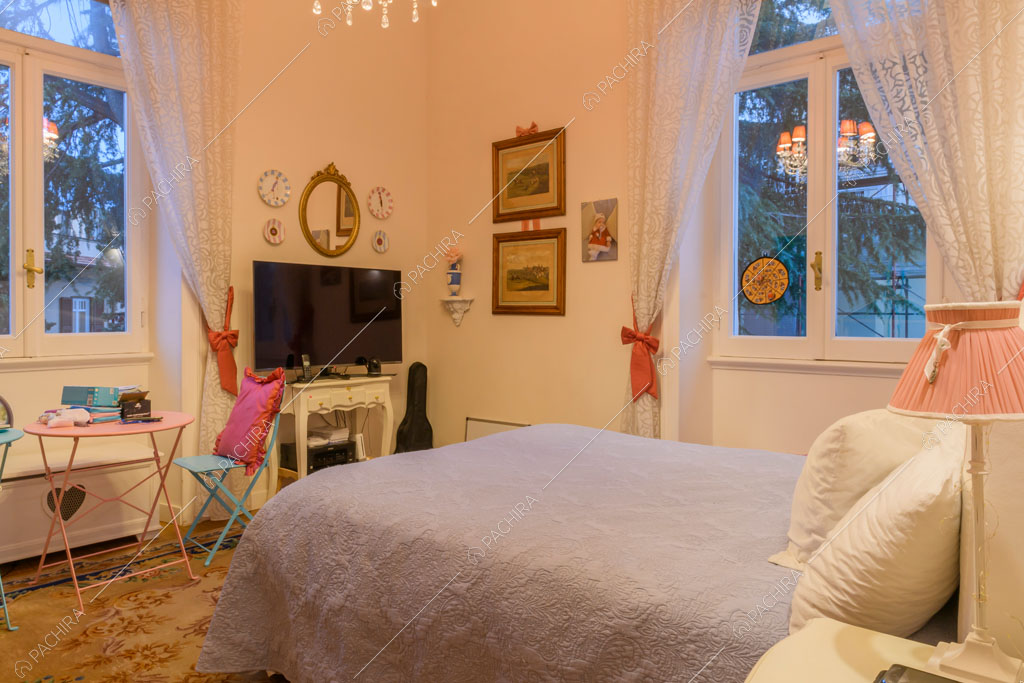 Camera da letto della location Amur, appartamento in stile insolito a Roma