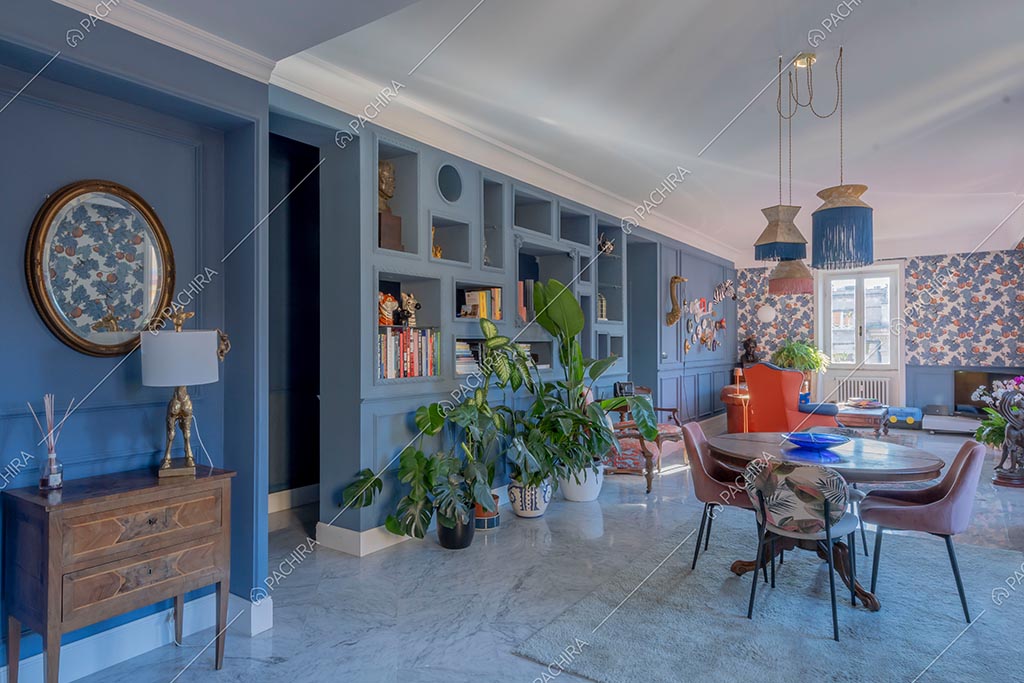 Zona living dell'appartamento Zambesi, location in stile eclettico a Roma
