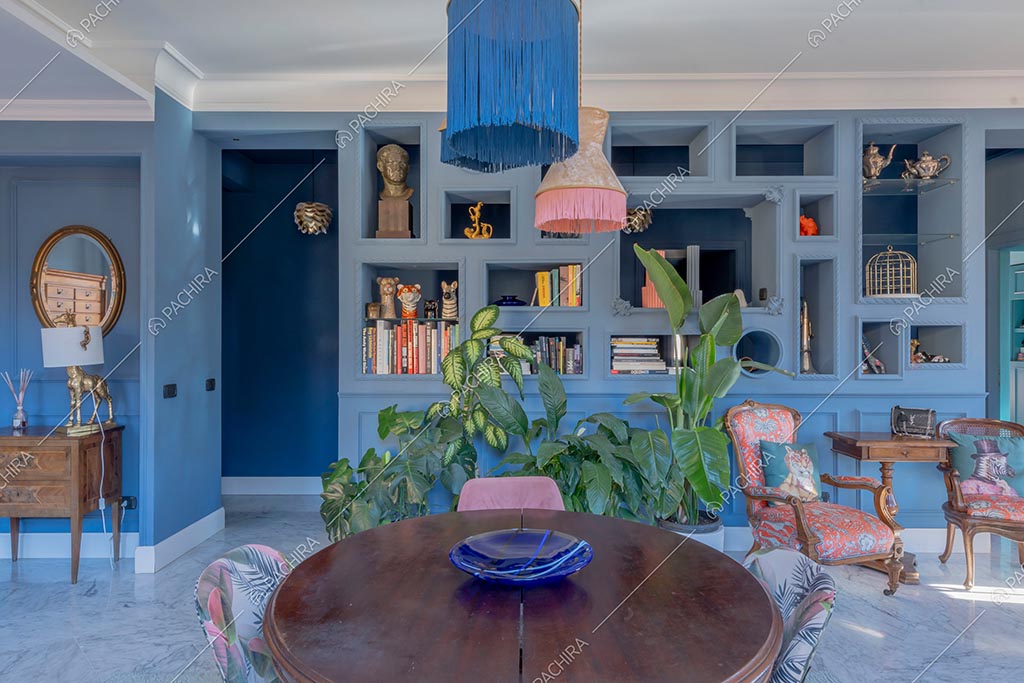 Zona living dell'appartamento Zambesi, location in stile eclettico a Roma
