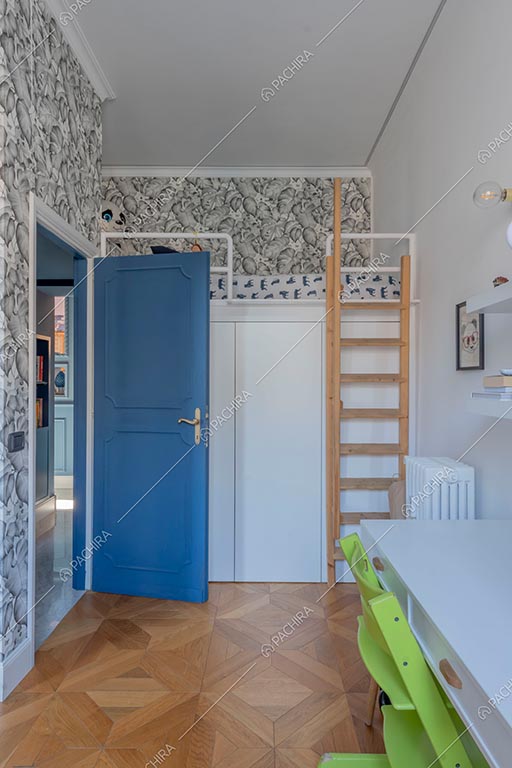 Camera da letto dell'appartamento Zambesi, location in stile eclettico a Roma