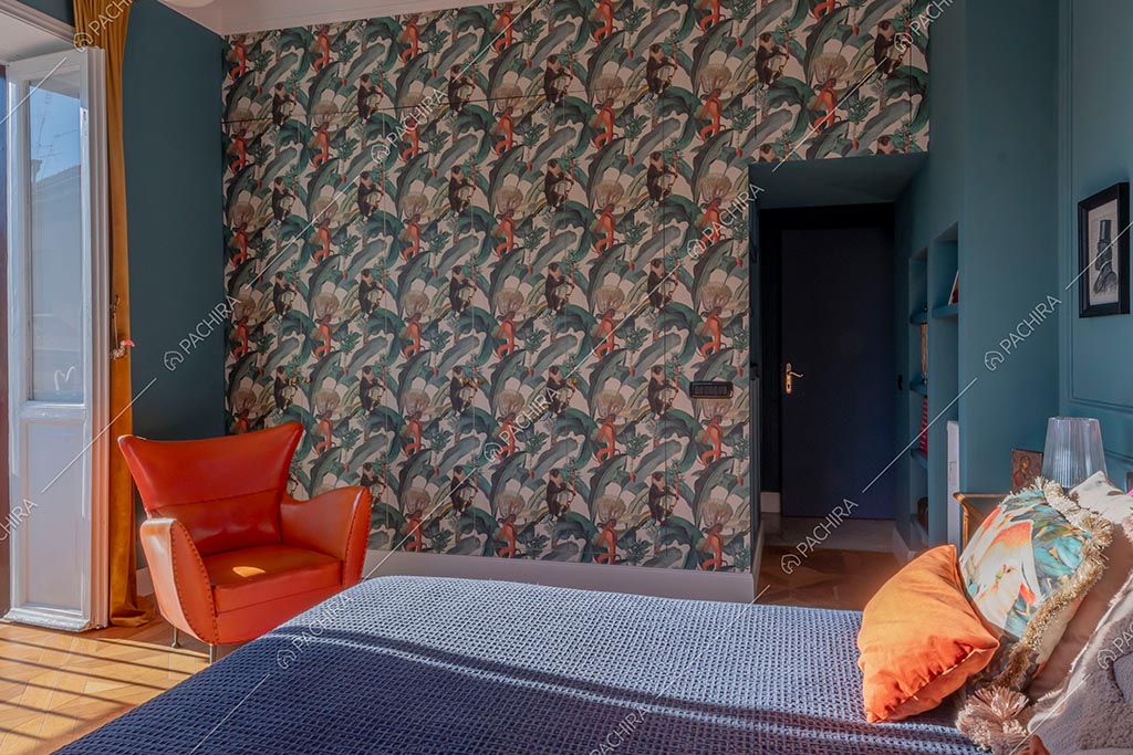 Camera da letto dell'appartamento Zambesi, location in stile eclettico a Roma