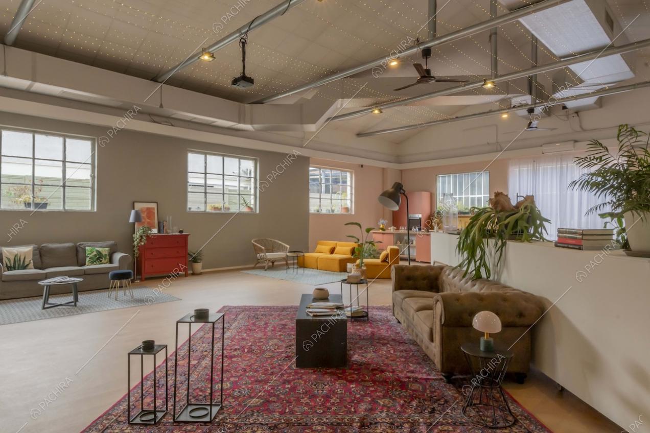 Zone living dello studio Eclipse, location in stile contemporaneo a Milano
