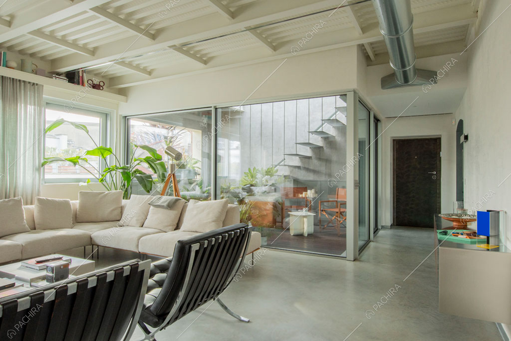 Zona living dell'appartamento Kamet, location in stile contemporaneo a Milano