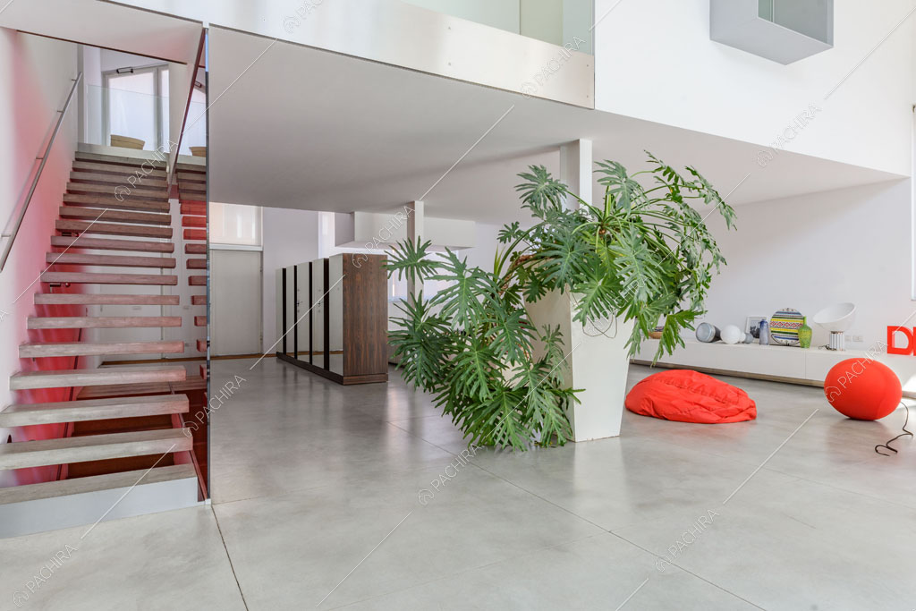 Zona living del loft Inula, location in stile contemporaneo a Varese