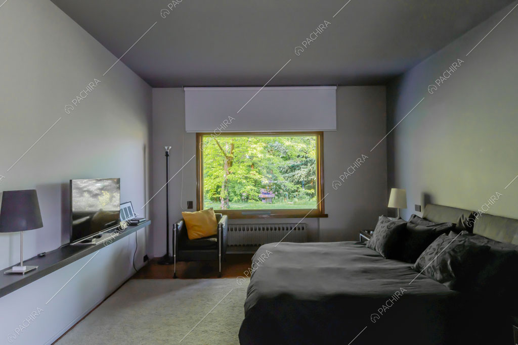 Camera da letto della villa Biotite, location in stile moderno a Verona