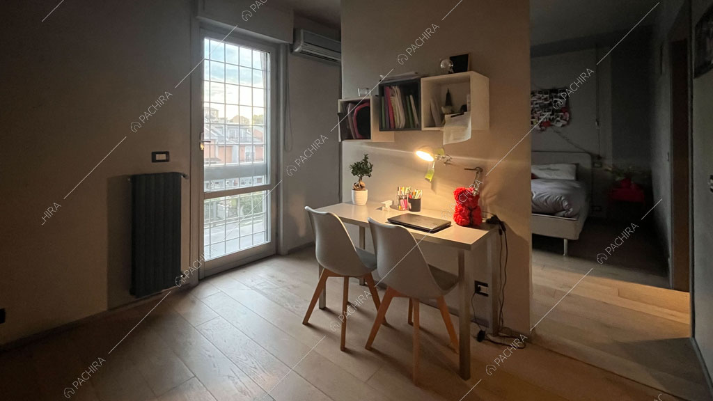 Camera da letto della villa Andesine, location in stile moderno a Roma