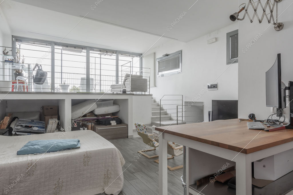 Camera da letto del loft Ostro, location in stile contemporaneo a Milano