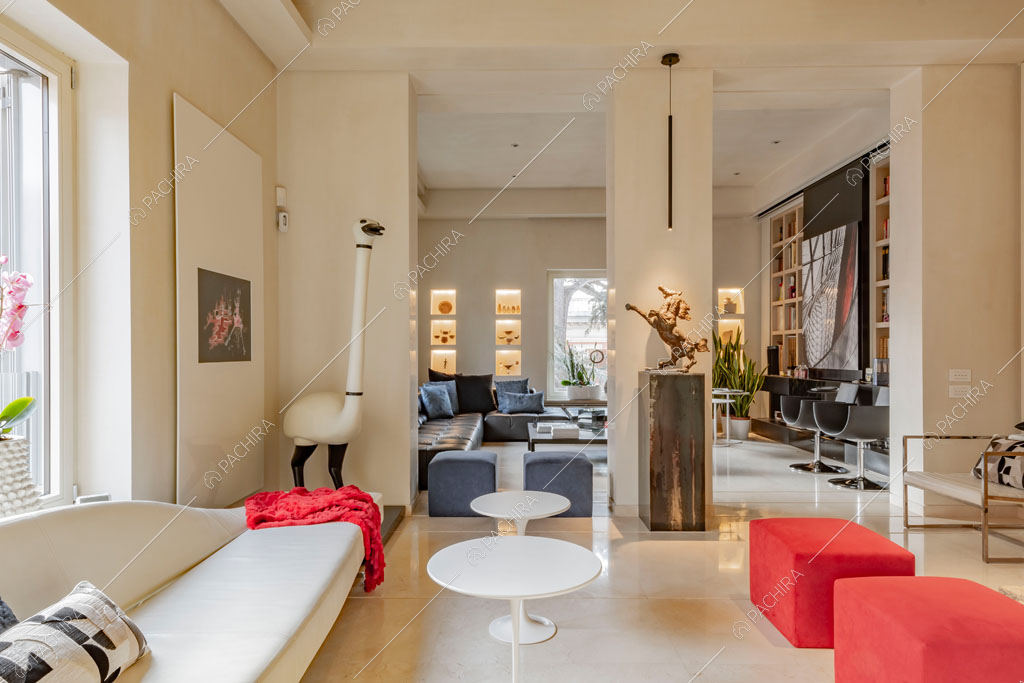 Ampia zona living dell'appartamento Kamala, location in stile contemporaneo a Roma