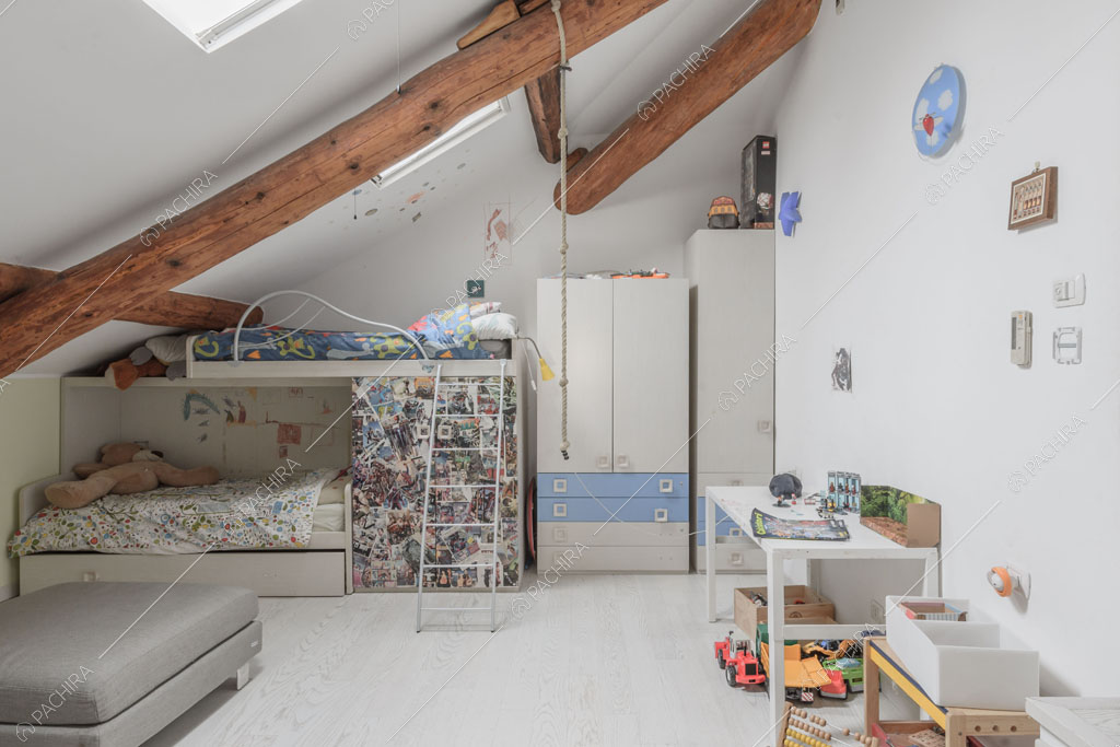 Camera da letto dei bambini del loft Ostro, location in stile contemporaneo a Milano