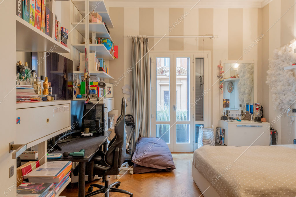 Camera da letto dell'appartamento Yalu, location in stile contemporaneo a Roma