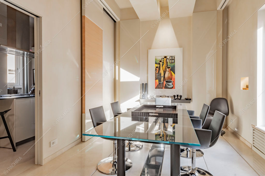 Vista sulla cucina dell'appartamento Kamala, location in stile contemporaneo a Roma