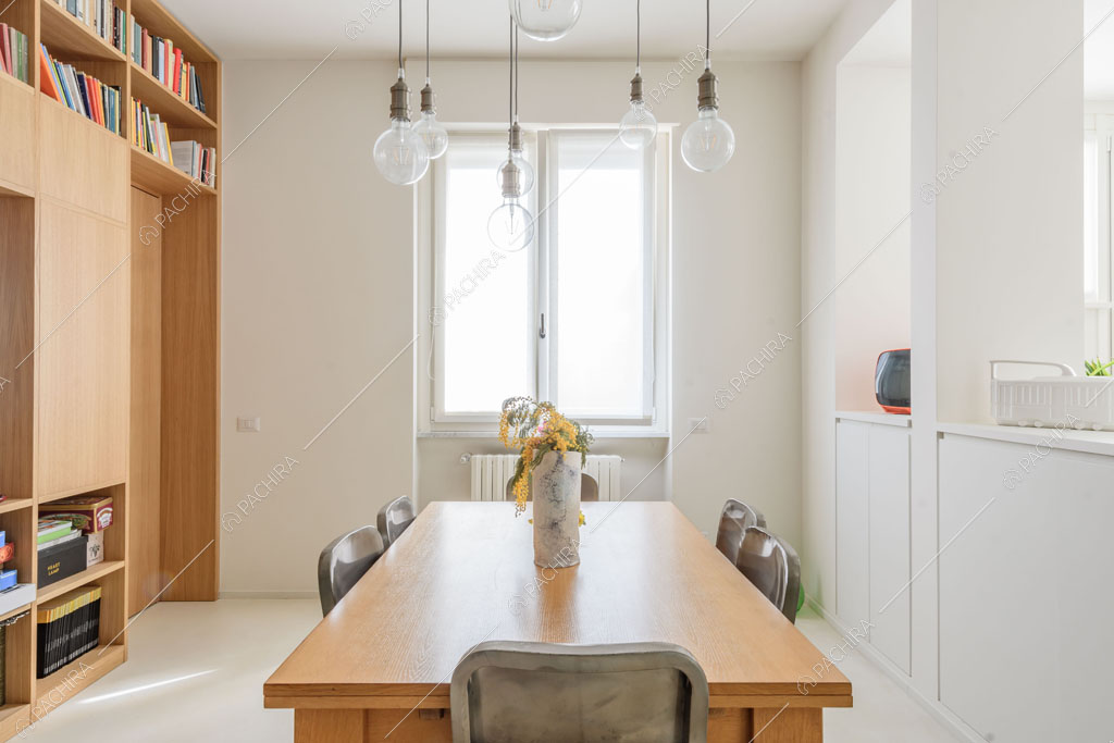 Sala da pranzo dell'appartamento Papagayo, location in stile contemporaneo a Milano