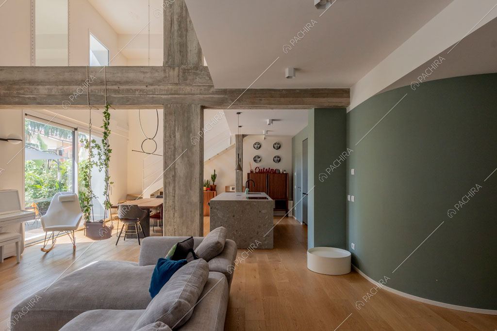 Zona living del loft Fenice, location in stile contemporaneo a Milano