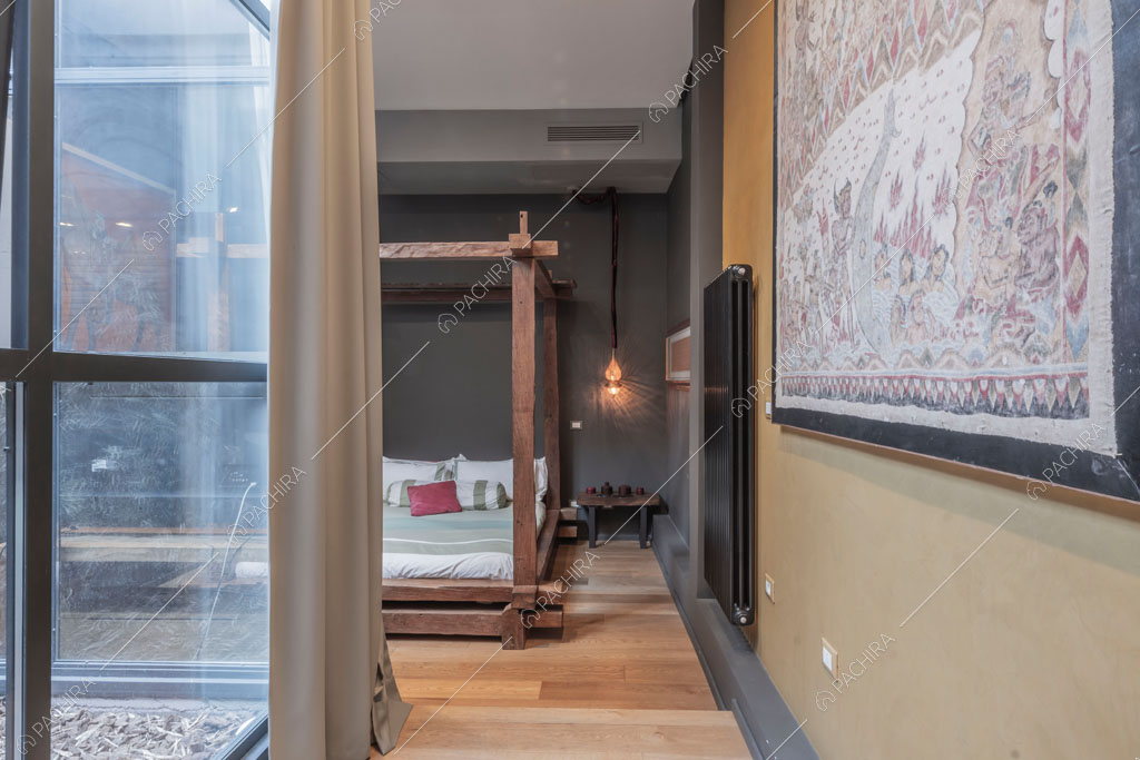 Vetrate nella camera da letto del loft Berillio, location in stile contemporaneo a Roma