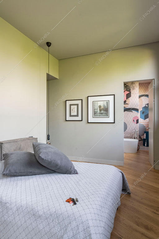 Camera da letto del loft Danubio, location in stile contemporaneo a Brescia